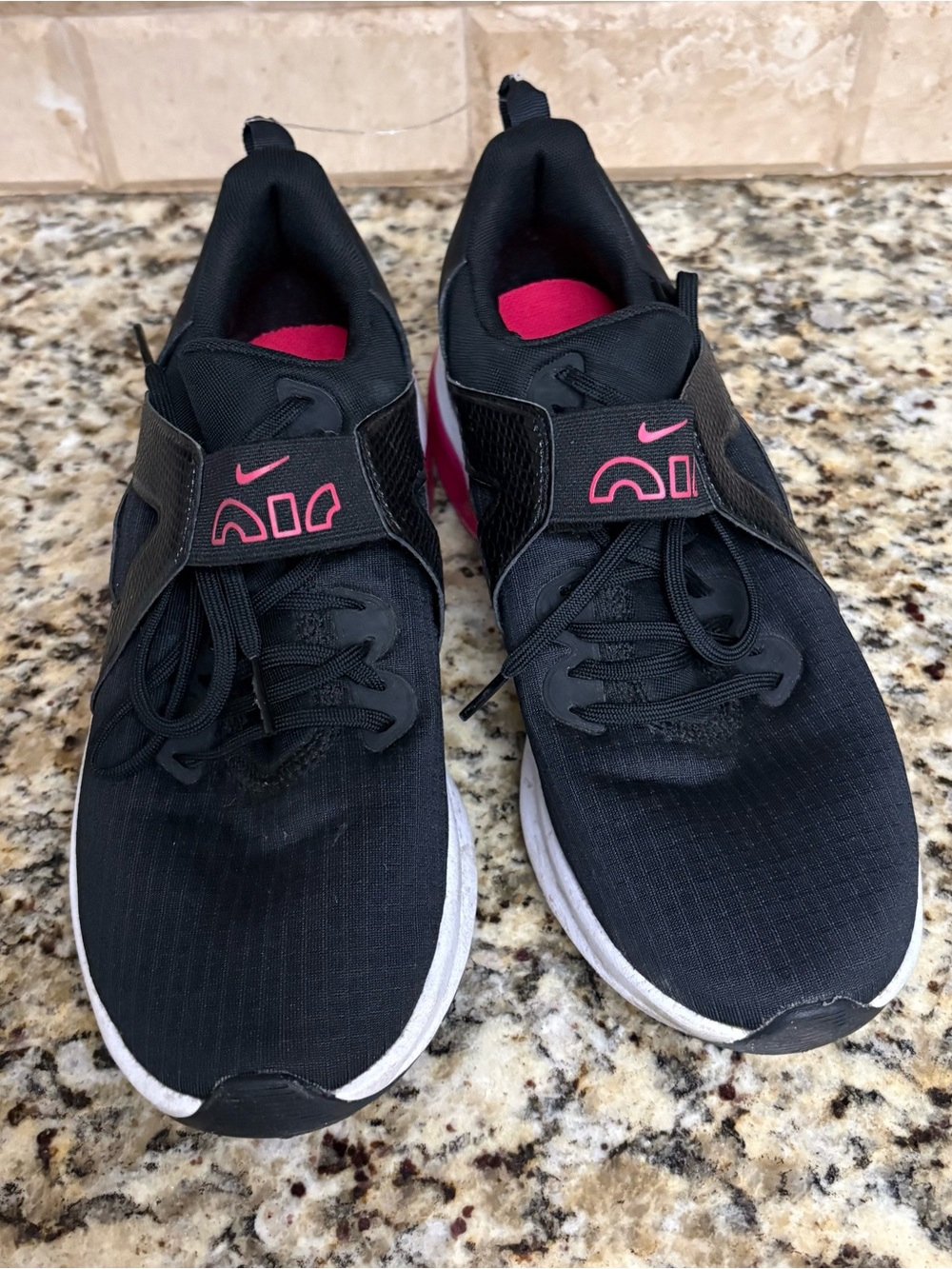 Nike Women's Black Athletic Sneakers with Pink Accents